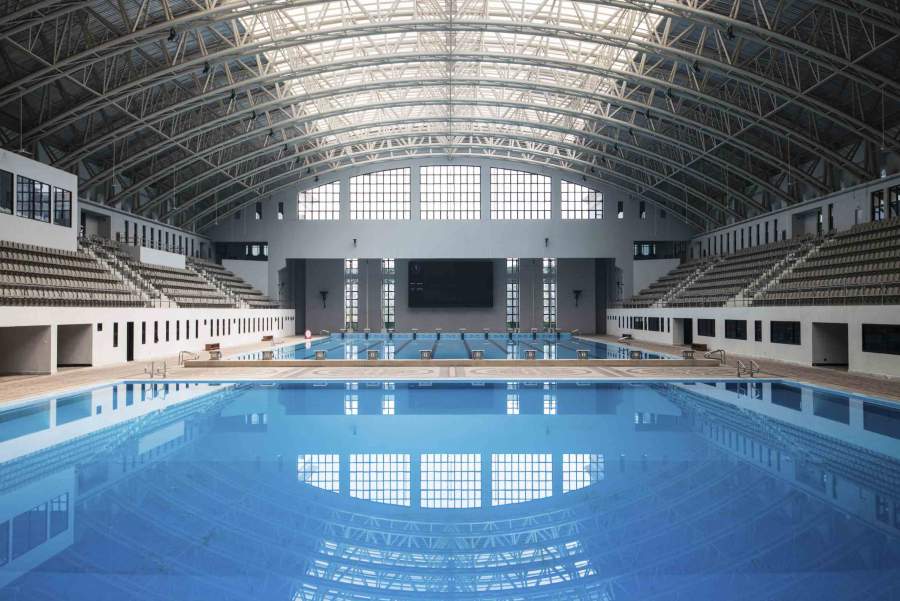 Two Large Swimming Pools With Spectator Seating Areas