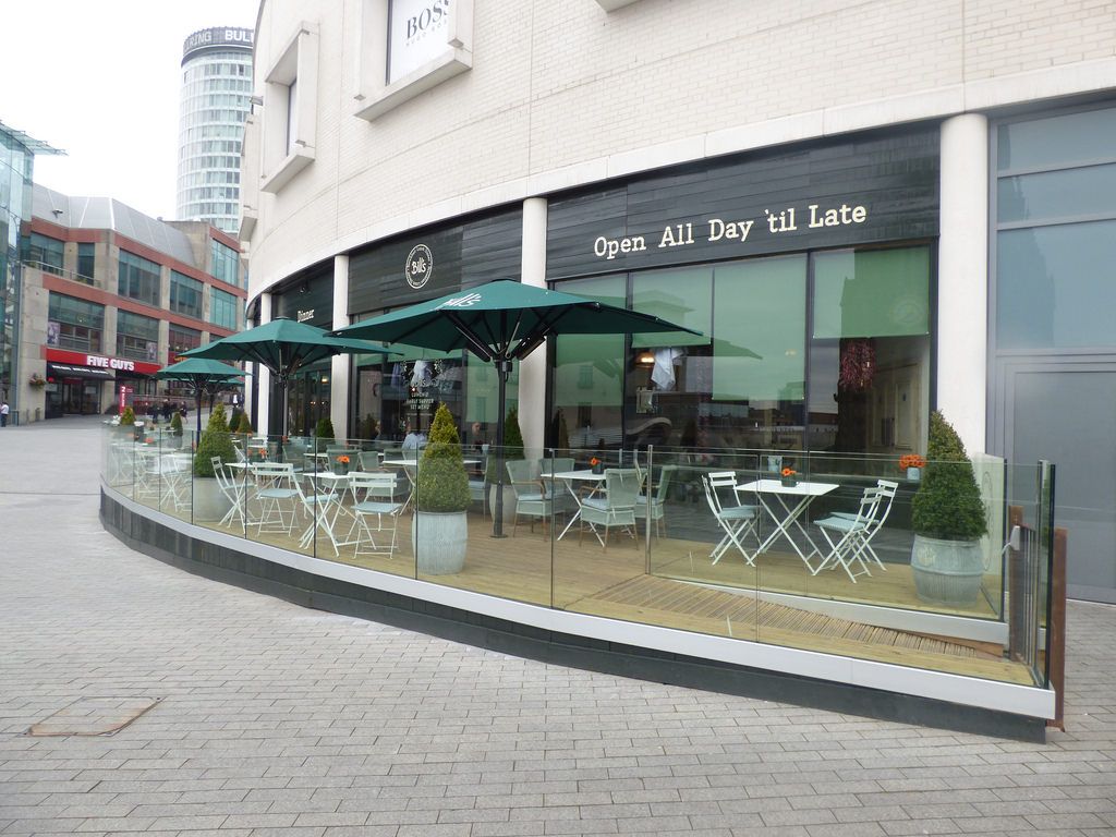Restaurant Outdoor Eating Area with Parasols with Infrared Heaters
