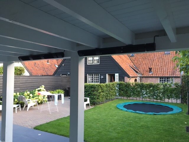 Ceramic Infrared Heaters Installed In Awning Of Garden