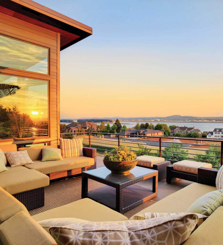 Domestic Terrace With Outdoor Seating Area Near The Sea At Sunset