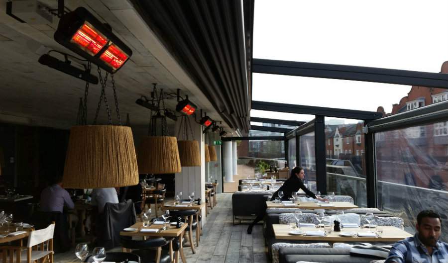Tansun Monaco Double Low Glare Infrared Heaters Heating Outdoor Dining Area At Bank Restaurant