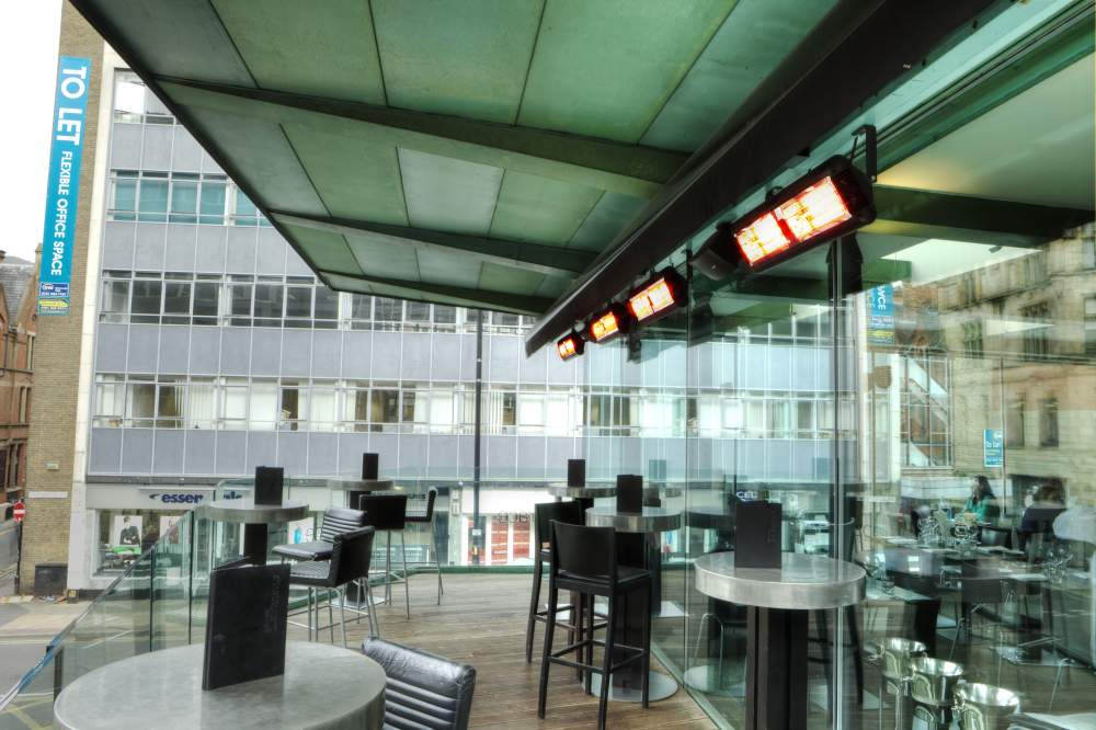 Tansun Sorrento Double infrared heaters installed in the outdoor area of a restaurant