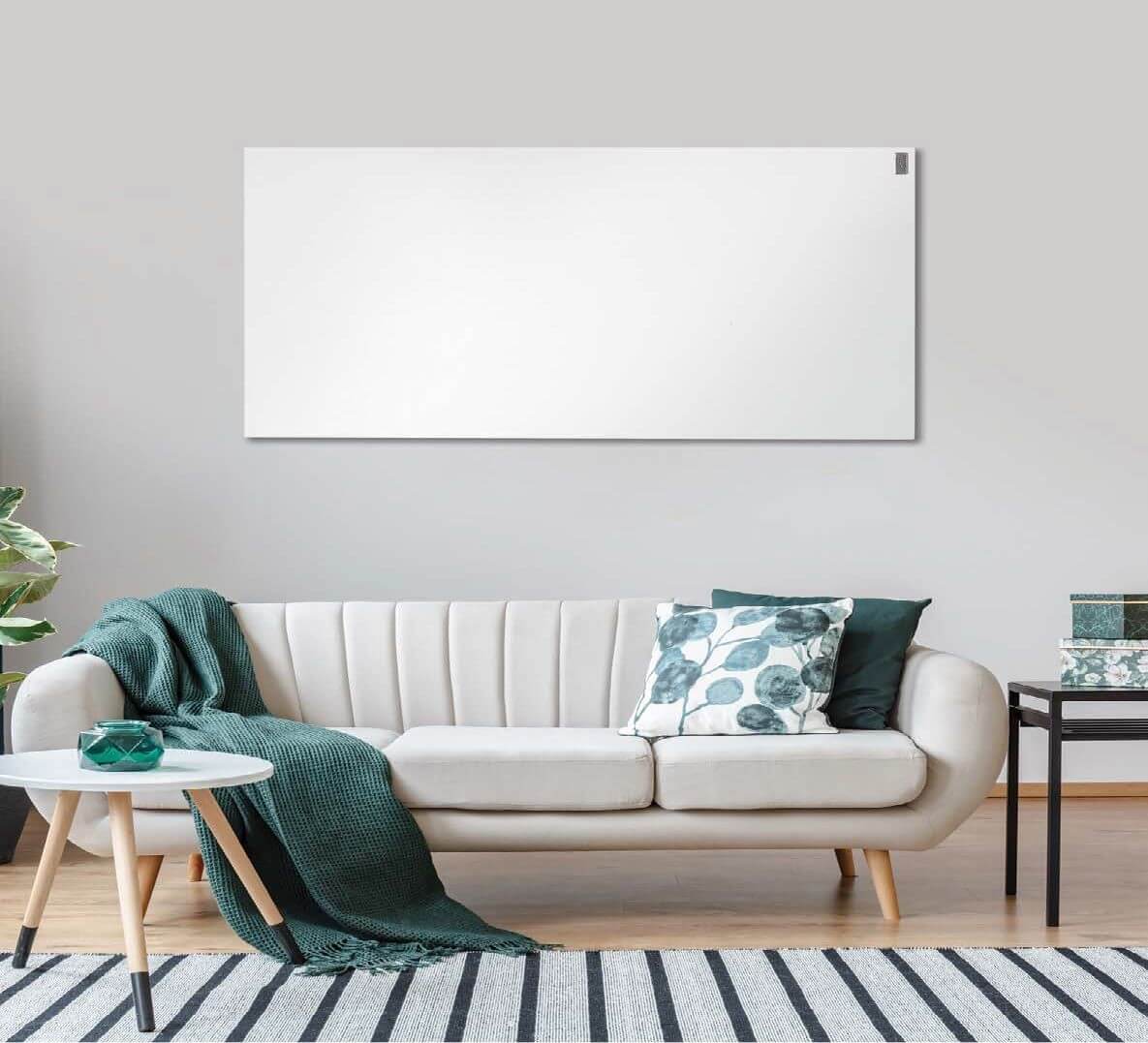 Living room with infrared heat panel mounted on wall
